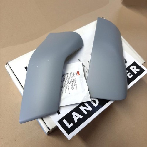 Pair covers mirror housing